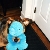 Hailey with Bday present on her 1st bday 